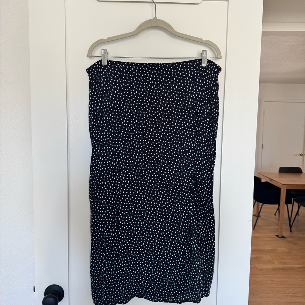 Black and white polka dot slip skirt with slit